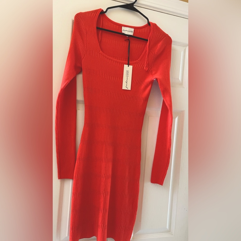 Beautiful orange dress. Soft comfortable material.